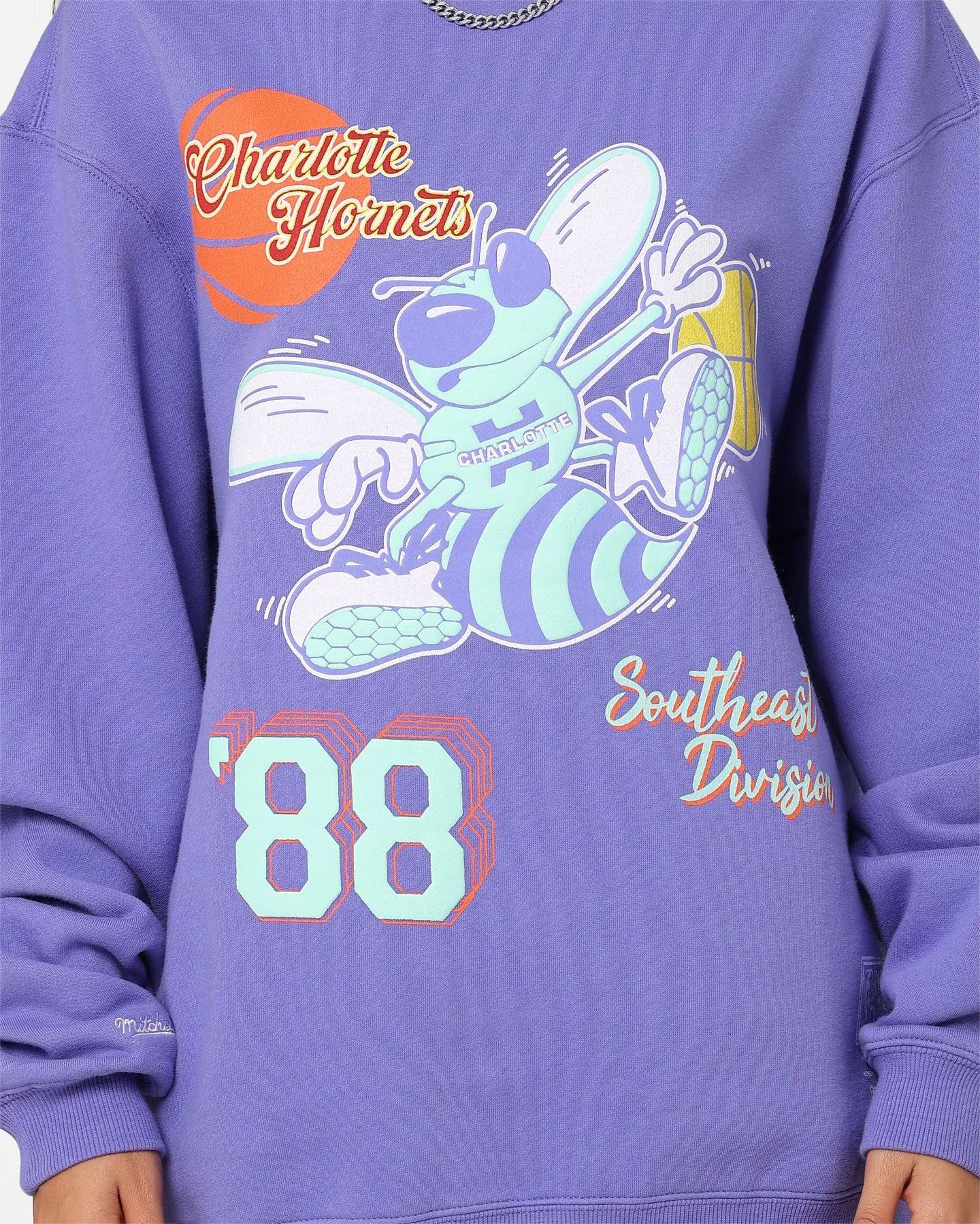 Mitchell & Ness Women's Charlotte Hornets Logo Crewneck Purple