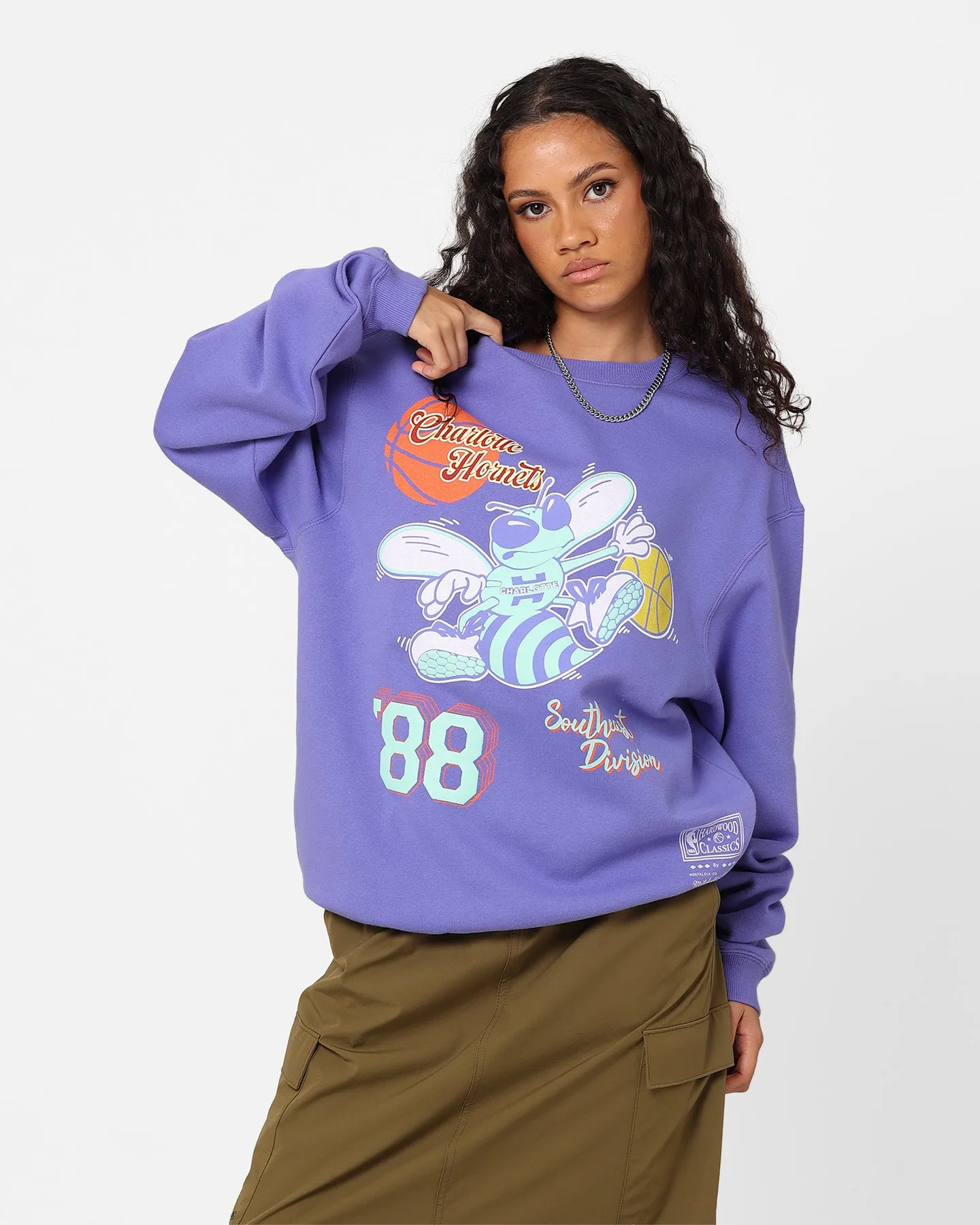 Mitchell & Ness Women's Charlotte Hornets Logo Crewneck Purple