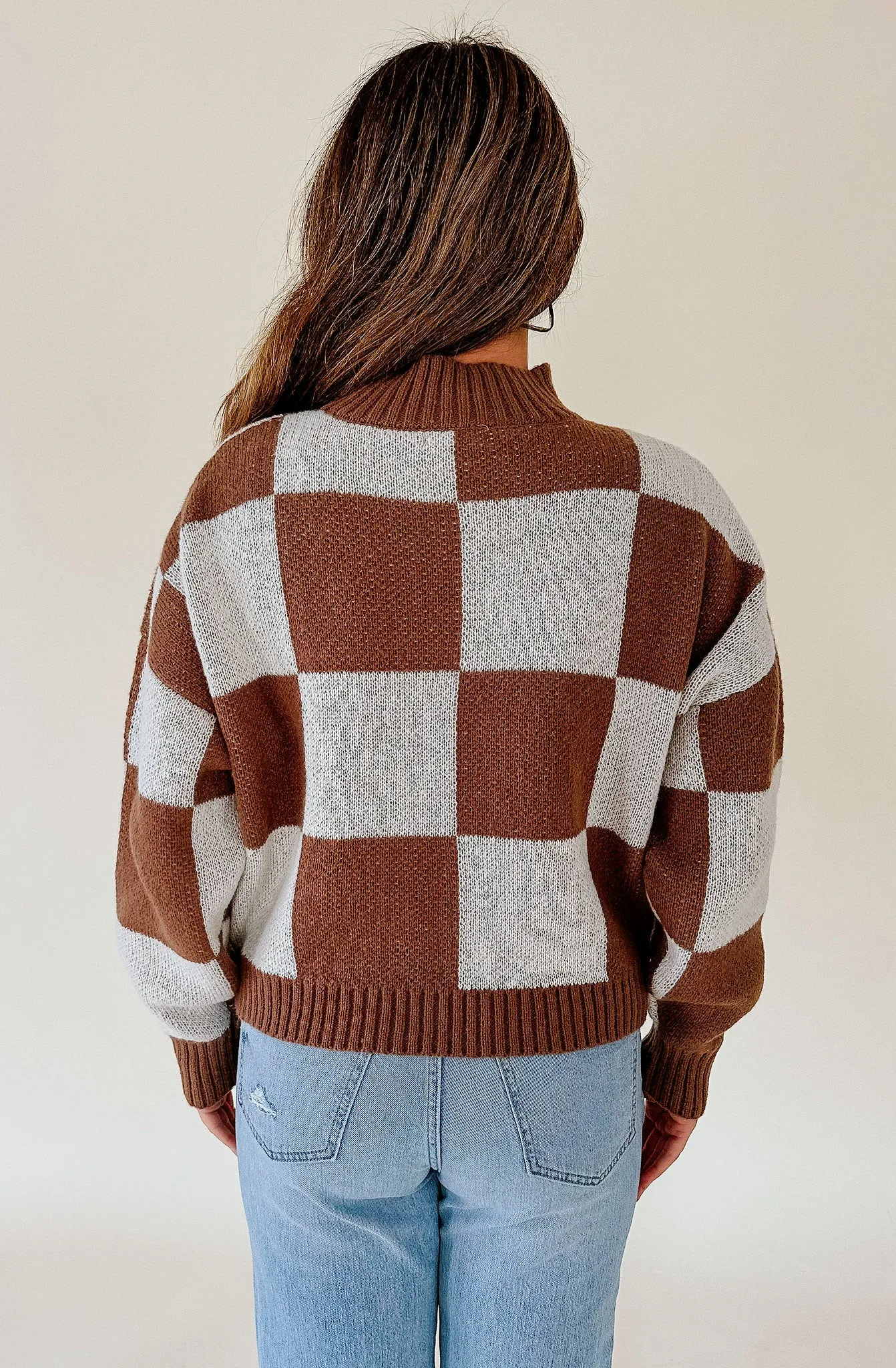 WARM AND COZY CHECKERED SWEATER